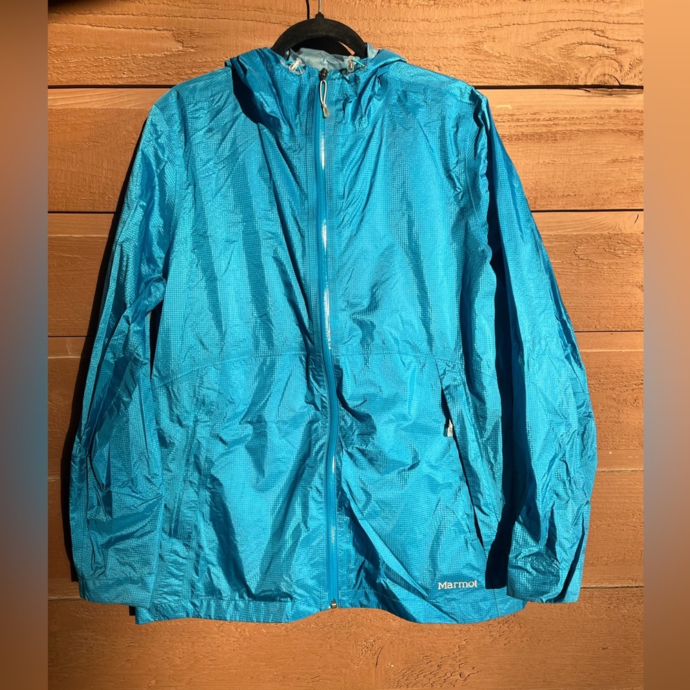 Marmot women’s windbreaker hoodie size XL. Turquoise.